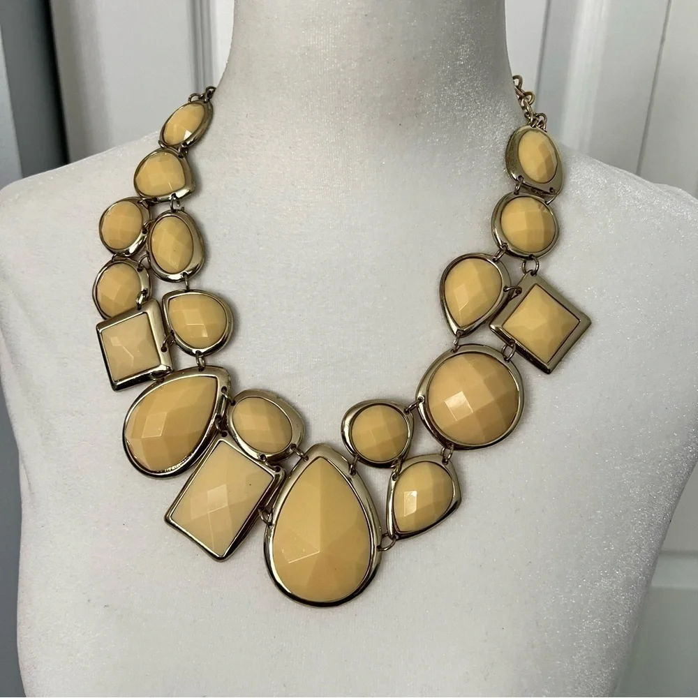 Cream colored faceted bead statement dramatic bib necklace on gold tone chain
